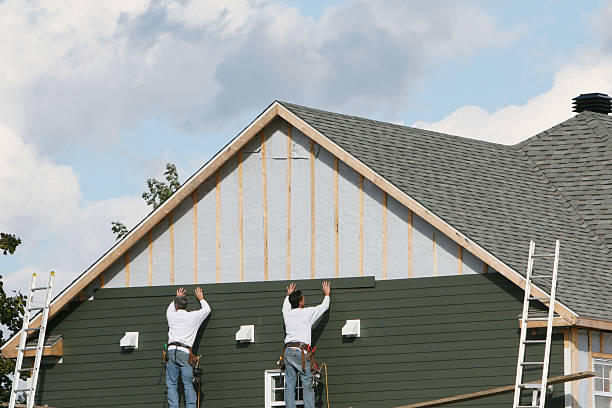 Professional Siding Replacement technician working in Wharton, TX